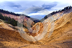 Erosional view of Ruginoasa Pit from Apuseni mountains photo