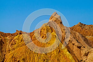 Eroted red and yellow mountains and rock formation valley