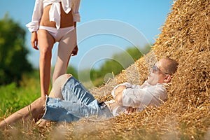 Erotic scene on hayloft photo