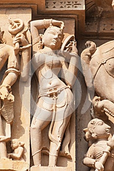 Erotic Sculpture in Kandariya Mahadeva Temple, Khajuraho, India photo