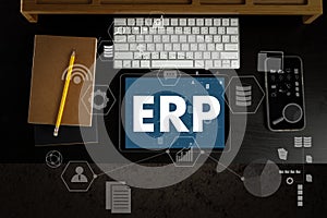 ERP as Emergency Response Procedures Thoughtful male person looking to the digital tablet Enterprise Resource Planning ERP