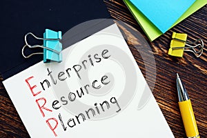ERP Enterprise Resource Planning is shown on the conceptual business photo