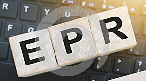 ERP Enterprise Resource Planning on wood cubes on computer keyboard