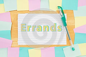 Errands type message on lined paper with multi-color sticky notes photo