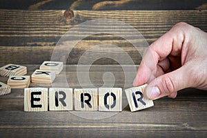 Error. Wooden letters on the office desk, informative and communication background