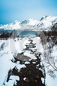 Ersfjordelva river which flows into Ersfjord, a Fjord in Northern Norway photo