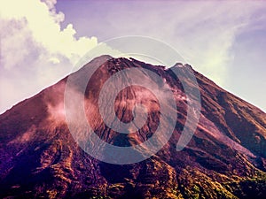 Erupting Arenal Volcano Costa Rica with a red glow