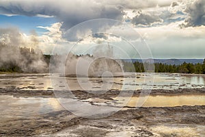 Erupting Great Fountain Geyser in Yellowstone National Park, Wyoming, USA