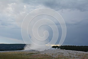 erupting old faithful geyser in Yellowstone national park
