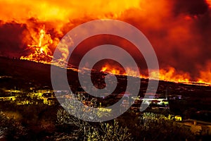 Erupting volcano, cumbre vieja, la Palma at night in December photo