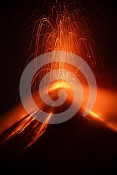 Eruption and lava ob the Fuego volcano photo
