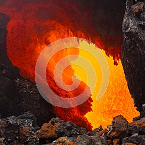 Eruption of Volcano Tolbachik, boiling magma flowing through lava tubes under the layer of solid lava, Kamchatka Peninsula, Russia