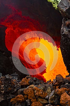 Eruption of Volcano Tolbachik, boiling magma flowing through lava tubes under the layer of solid lava, Kamchatka Peninsula, Russia