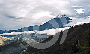 Eruption of a volcano Tungurahua and town Banos de Agua Santa in