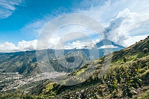 Eruption of a volcano Tungurahua and town Banos de Agua Santa