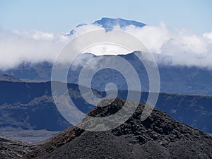 eruptive cone on the Fournaise volcano, Piton des neiges in the far background, Reunion