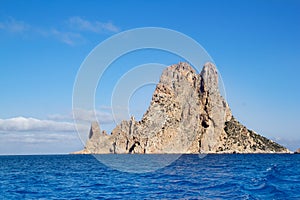 Es Vedra islet island in blue Mediterranean