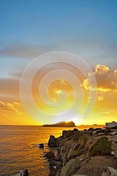 Es Vedra after the sunset, pastel colored sky at the mystic rock of Es Vedra, Ibiza Island