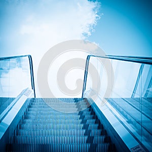 Escalator and blue sky