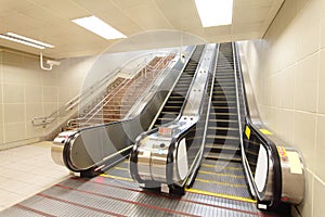 The escalator moving at metro station