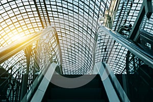 Escalator moving up at indoors in building