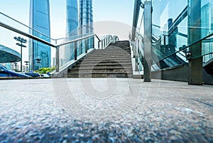 Escalator of Shanghai streets, skyscraper buildings.