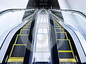 Escalator Stairs Up and Down in Modern Building Interior