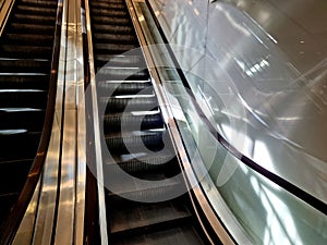 escalator and travelator service and adjustment. lubrication and regular