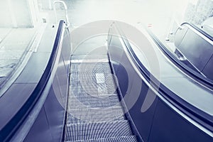 Escalator, up and down escalators in public building or subway