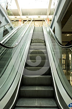 Escalators going up and down photo