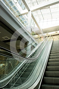Escalators in shopping mall photo