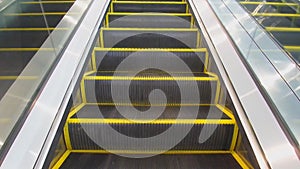 Escalators are shown that constantly run upstairs