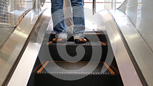 Escalators are shown that constantly run upstairs