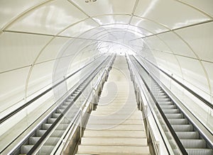 Escalators in a tunnel of a modern Metro station.
