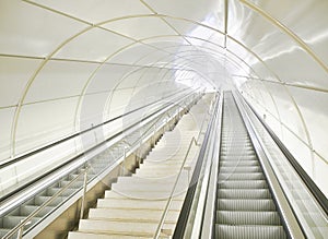 Escalators in a tunnel of a modern Metro station.