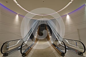 Escalators in Underground Tunnel photo