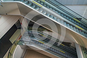 Two floors modern empty escalator stairs