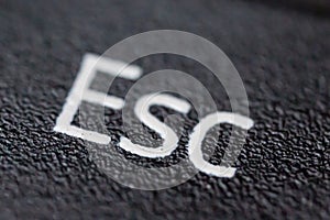 Escape esc black button, closeup
