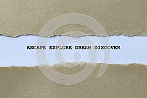 escape explore dream discover on white paper