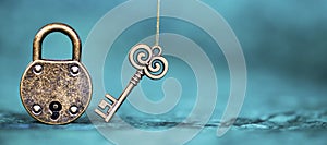 Escape room game banner, old vintage key and padlock photo