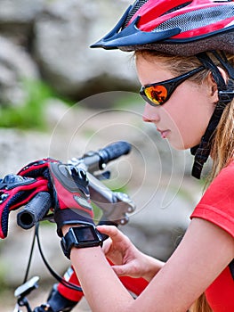 Escape urban. Bicycle girl wearing helmet rest from city urbanization.