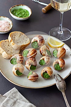Escargots de Bourgogne. Snails with herbs butter. Healty eating. French food