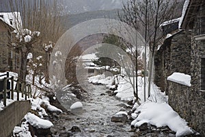 Escrita river as it passes through Espot in winter. photo