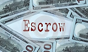 ESCROW - acronym on the background of cash dollar bills
