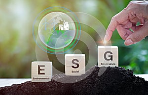 ESG Carbon neutrality on a net basis. In business, the hand of pollution and effective management with netzero symbols - renewable photo