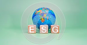 ESG concept for environment, society and governance in sustainable. business responsible environmental. Wooden blocks with ESG