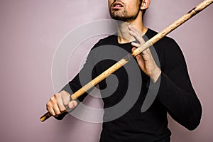 Eskrima stick-fighter with rattan stick