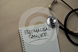 Esophageal Cancer write on a book isolated on office desk