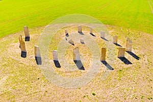 Esoteric geomancy symbol in green wheat field.