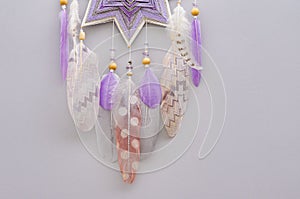 Esoteric woven mandala magical dreamcatcher  on grey background